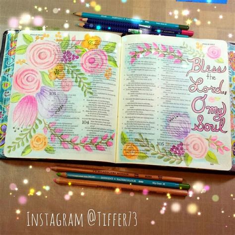 an open bible with colorful flowers and words on it