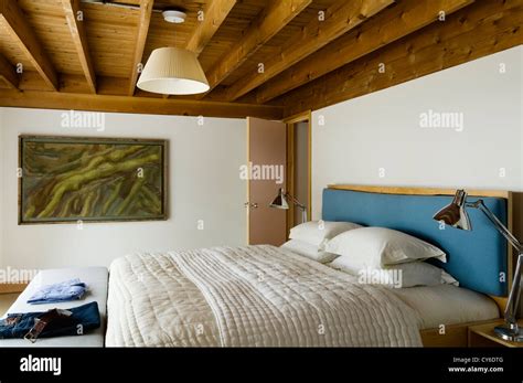 Bedroom with beamed wooden ceiling Stock Photo - Alamy