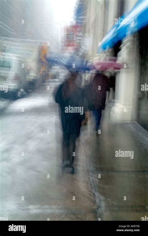 People Walking in Rain Stock Photo - Alamy