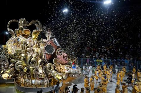 Party animal becomes legendary Carnival parade director | AP News