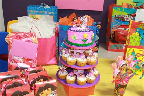 Dora an Diego Birthday Party! Dora Cake/ Dora Cupcake Stand. I made the stand and decorated the ...