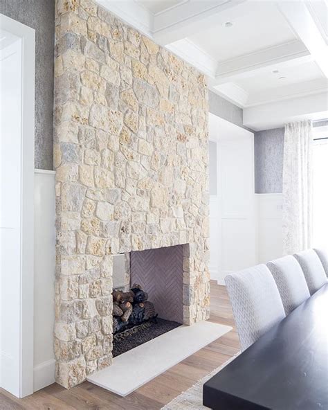 If this natural stone double-sided fireplace isn't crush worthy we don't know what is ...