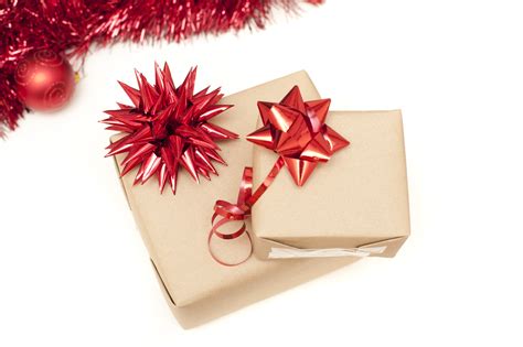 Photo of Two plain wrapped Christmas gifts with bows | Free christmas ...