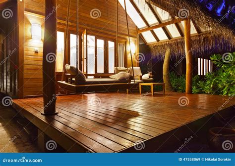 Beach Bungalow at Sunset - Maldives Stock Image - Image of chairs, lights: 47538069