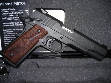 Taurus PT1911 with walnut grips in columbus, Ohio gun classifieds ...