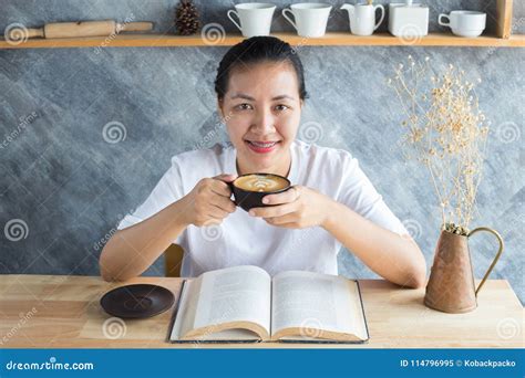 Reading book with coffee stock image. Image of morning - 114796995