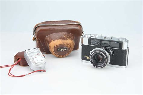 Lot 418 - An Olympus Auto Eye Rangefinder Camera,