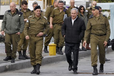 Netanyahu laughs off AG's 'amusing' ban on campaign photos with ...