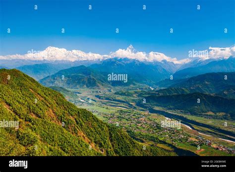 Annapurna massif aerial panoramic view from Sarangkot hill viewpoint in Himalayas mountain range ...