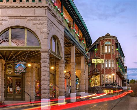 Colorful Evening Skies Over Downtown Eureka Springs Arkansas Photograph by Gregory Ballos