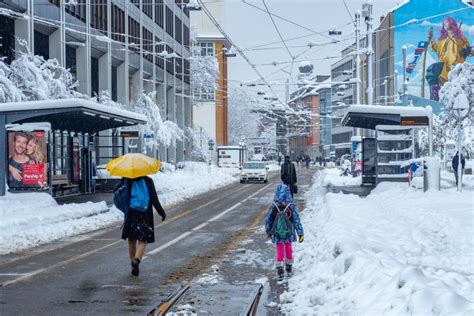 Zurich, Switzerland - January 15th 2021: People Walking Due To Heavy ...