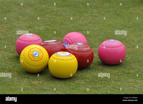 Coloured lawn bowls Stock Photo - Alamy