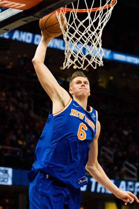 Download Kristaps Porzingis NBA Slam Dunk Wallpaper | Wallpapers.com