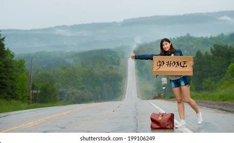 Girl Hitchhiking Holds Sign Stock Photo 199106249 | Shutterstock