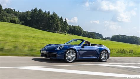 2020 Porsche 911 Carrera Cabriolet (Color: Gentian Blue Metallic) | Front Three-Quarter