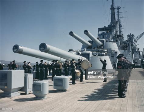 A band from the Royal Marines Band Service plays on the deck of the ...