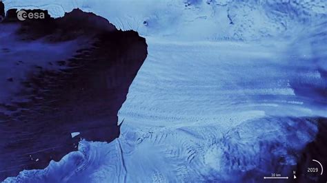 Watch the Pine Island Glacier give birth to a huge iceberg in satellite imagery - YouTube