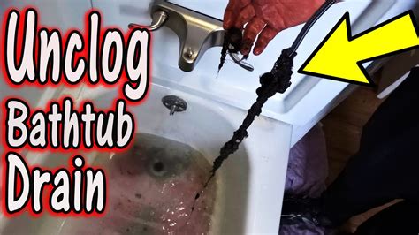 How to Unclog a Bathtub Drain ~ Clogged with TONS of Hair - YouTube