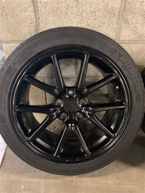 18" OEM Model 3 rims and tires - satin black | Tesla Motors Club