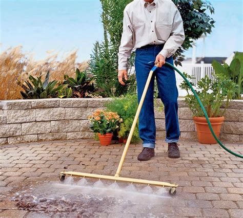 This Power Washing Broom Is a Genius Way To Clean Your Patio Or Garage