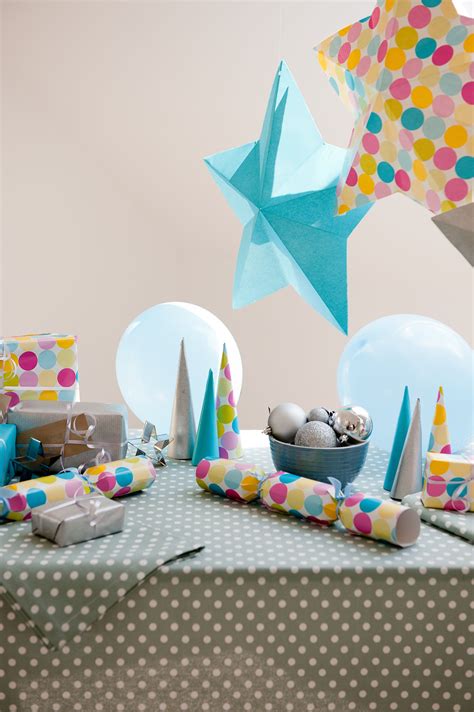 A fun Christmas table with pretty polka dots and accents of bright colours. From OchreandOcre ...