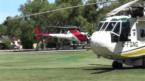 Helitack Helicopters use sports oval as Airport during WA Bushfires - YouTube