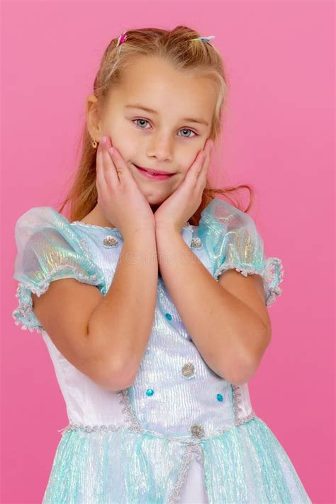 Beautiful Little Girl on a Pink Background. Stock Photo - Image of happy, background: 134203076