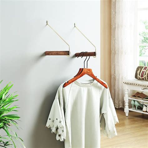 Nordic hanging clothes rack solid wood hanging clothes hook wall decoration brass personality ...