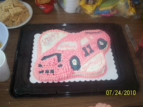 pink race car cake | Cars birthday cake, Race car cakes, Race car birthday