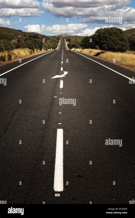 Asphalt road and white line marking Stock Photo - Alamy