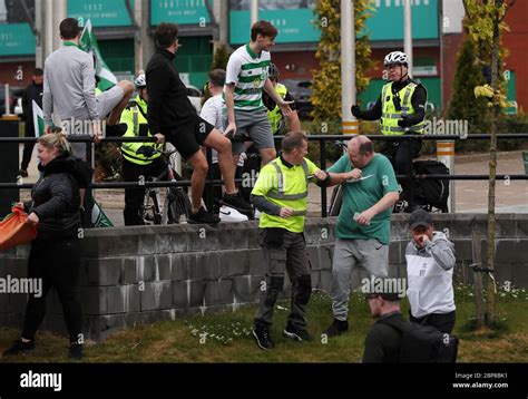 Celtic fans celebrate outside Celtic Park after Celtic were crowned ...