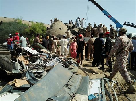 Pakistani train smashes into derailed carriages, 36 killed | Reuters