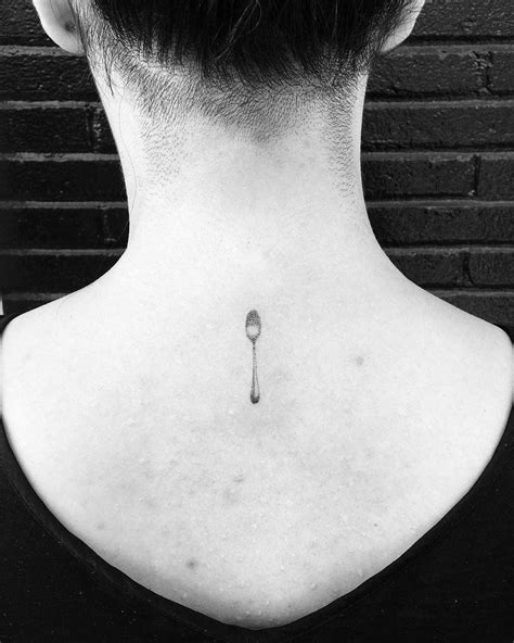 Tiny spoon tattoo by Robbie Ra Moore inked on the upper back | Tiny ...