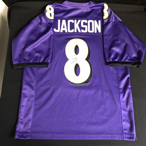 LAMAR JACKSON SIGNED FOOTBALL JERSEY (JSA COA)