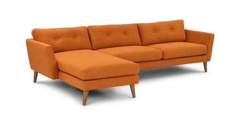 A modern spin on the classic button tufted sofa. Featuring flared arms ...