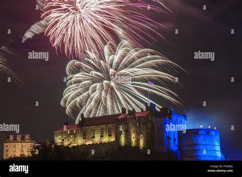 Edinburgh castle in fireworks scenery Stock Photo - Alamy