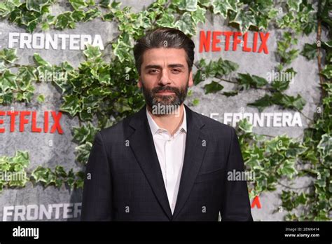 Guatemalan actor Oscar Isaac poses as he arrives for the premiere of ...