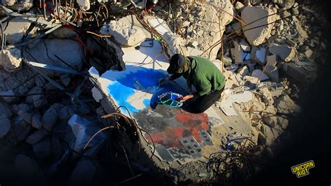 Palestinian Paints Murals on Rubble Amid War on Gaza - UNICORN RIOT