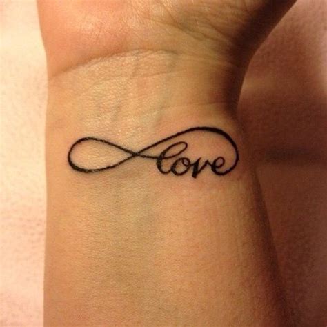 Infinity love tattoo | Infinity love tattoo, Wrist tattoos, Trendy tattoos