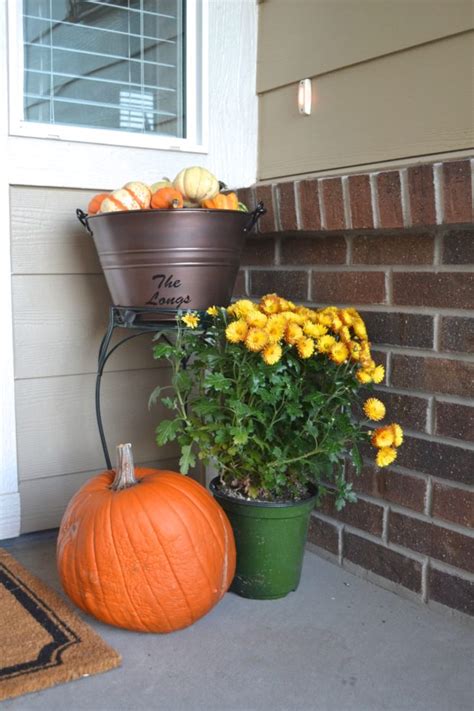 Fall-Front-Porch-pumpkins-mums - The Daily Hostess