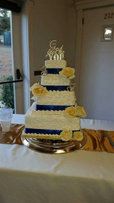 Royal blue and GOld wedding cake fresh roses. | Small wedding cakes ...