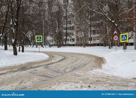 Snowy Road and Pedestrian Crossing with Road Signs Stock Image - Image ...