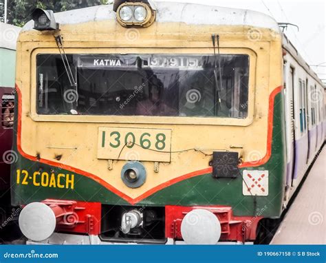 Passenger Train Stops at Katwa Junction Railway Station Platform. Katwa is a Kolkata Suburban ...