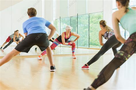 Fitness instructor leading aerobics class - Stock Image - F015/5639 ...