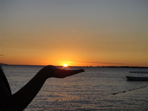 The most amazing sunset in Fiji....the sun is in my hand... | Travel ...