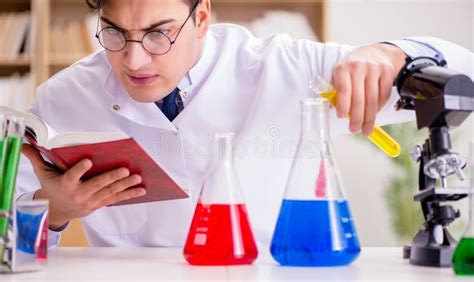 Mad Crazy Scientist Doctor Doing Experiments in a Laboratory Stock Photo - Image of coat ...