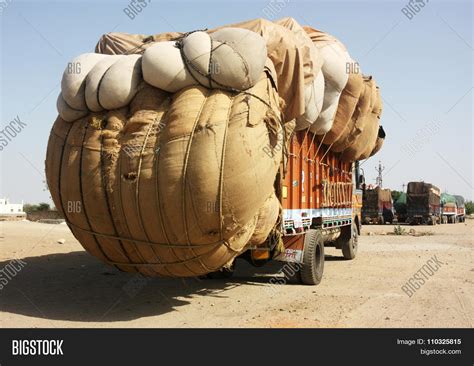 Overloaded Indian truck Stock Photo & Stock Images | Bigstock