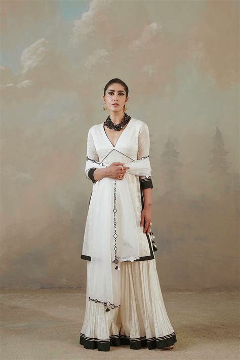 Ivory Self Striped Tissue Gharara Set - Sureena Chowdhri | Onam outfits ...