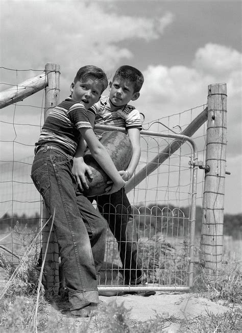 1950s Two Farm Boys In Striped T-shirts Photograph by Vintage Images - Fine Art America