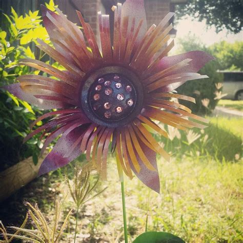 GardenDreamsDecor shared a new photo on Etsy | Tin can flowers, Soda can flowers, Metal flowers